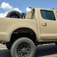 Illustration for article titled Check Out This Militarized Toyota Hilux and Its Weird Door Handles
